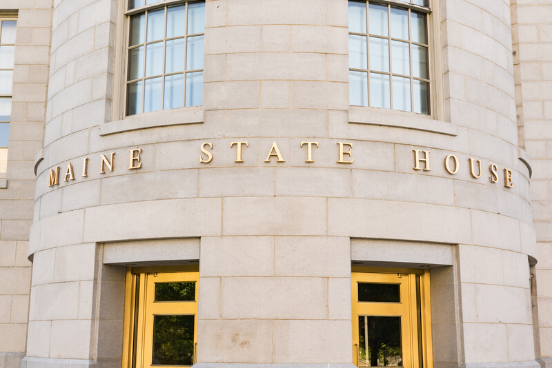 Facade of the Maine State House. Entrance to the Maine Capitol Building in Augusta