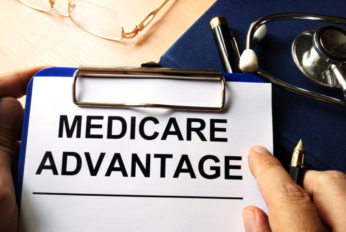 clipboard with Medicare advantage paper on it