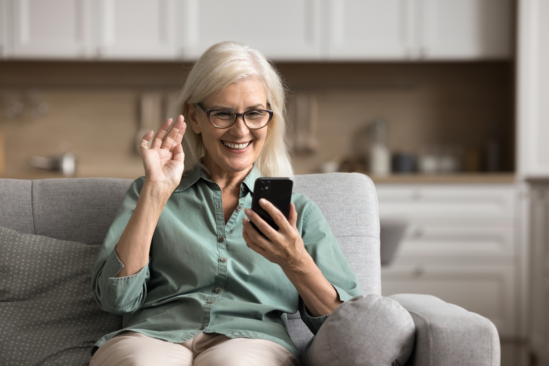 senior on smartphone